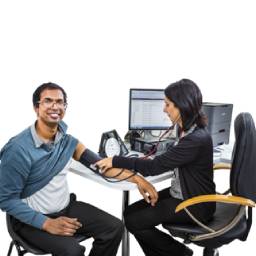 two people sitting at a desk