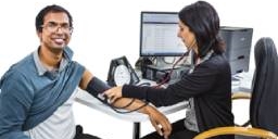 two people sitting at a desk