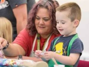 Anna painting with a child