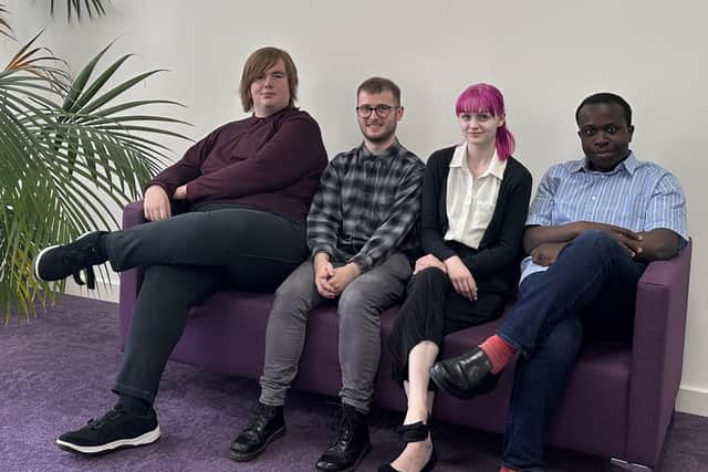 4 Experts by Experience sit together on a couch