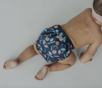 Baby in pepi collection nappy