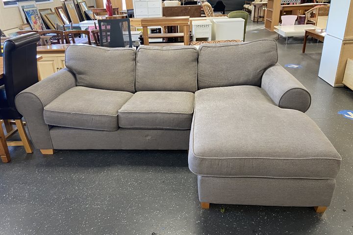 Corner sofa in a reuse centre