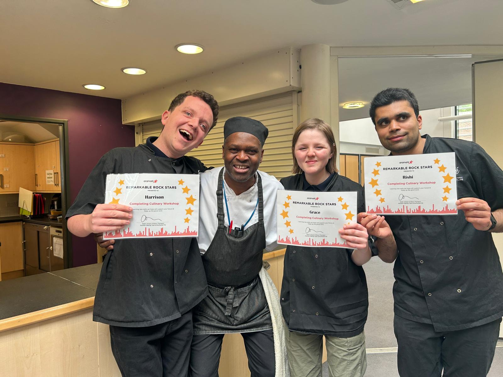 Photo showing the Mission EmployAble interns receiving their culinary certificates